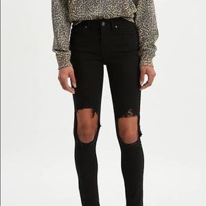 Levi’s 721 high-rise skinny jeans with open knees